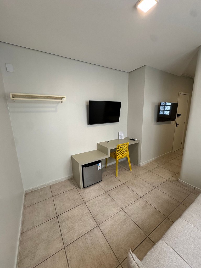 Quarto com banheiro privativo em pousada